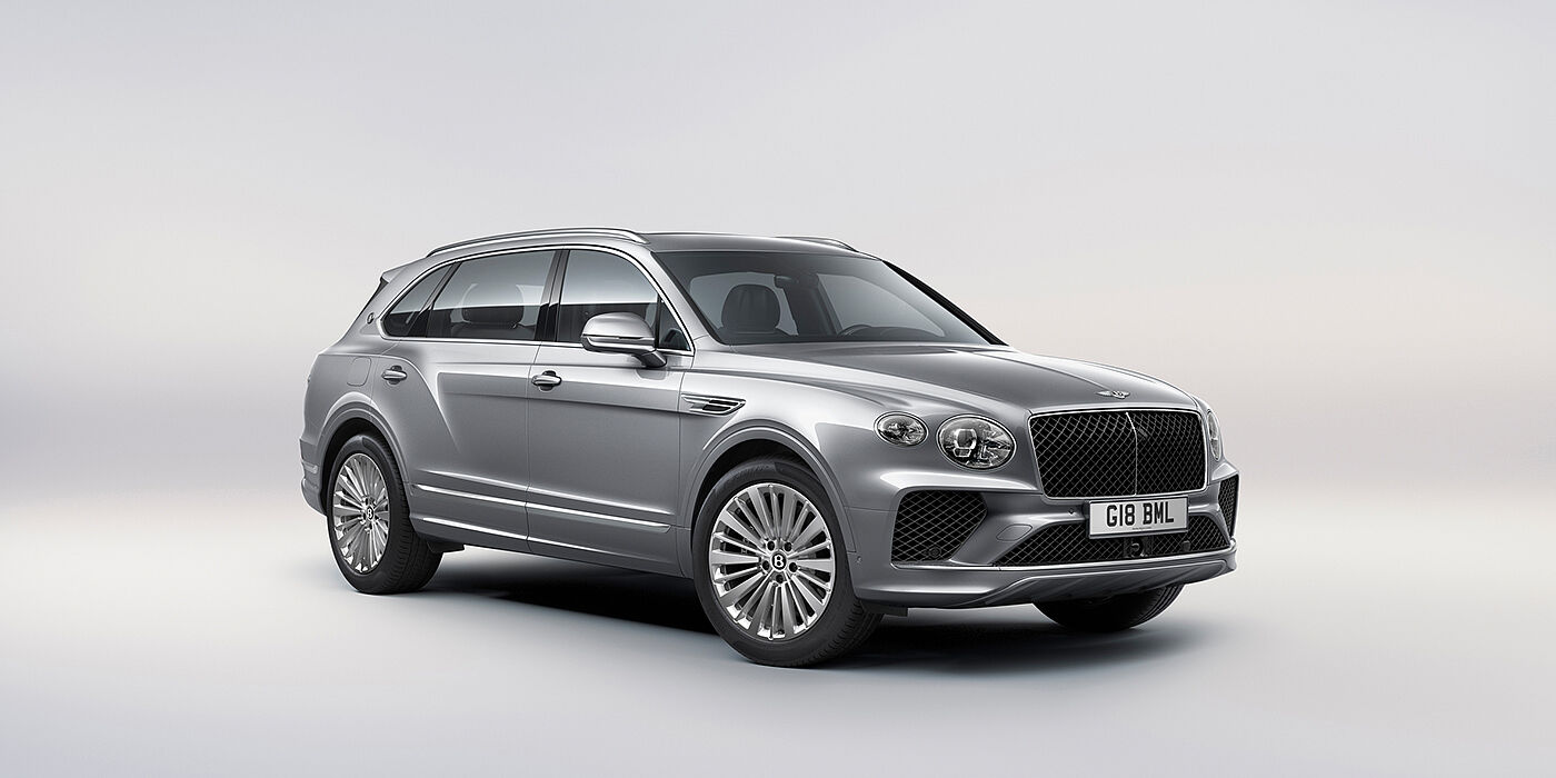 Bentley Tallinn Bentley Bentayga Extended Wheelbase luxury SUV front three quarter view in Moonbeam paint with 21 inch five spoke painted wheels