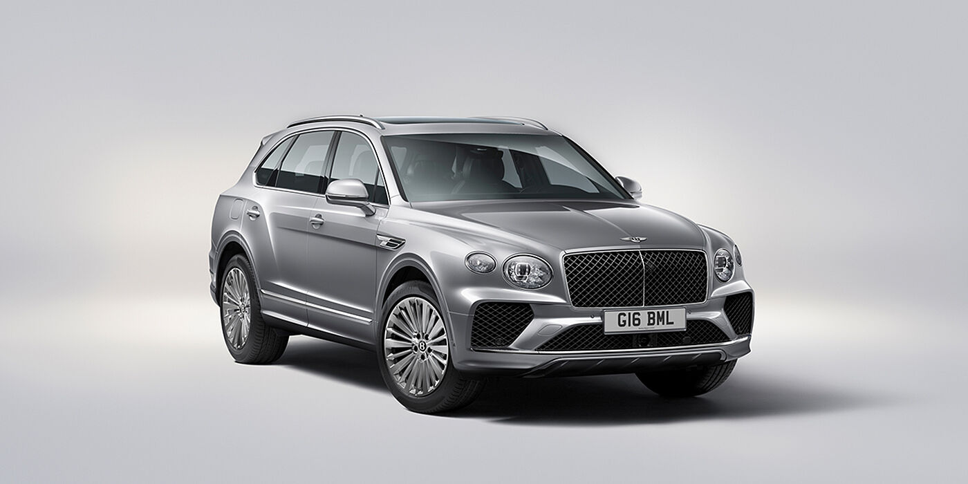 Bentley Tallinn Bentley Bentayga luxury SUV front three quarter view in Moonbeam paint with matrix grille and 21″ 5 spoke painted wheels