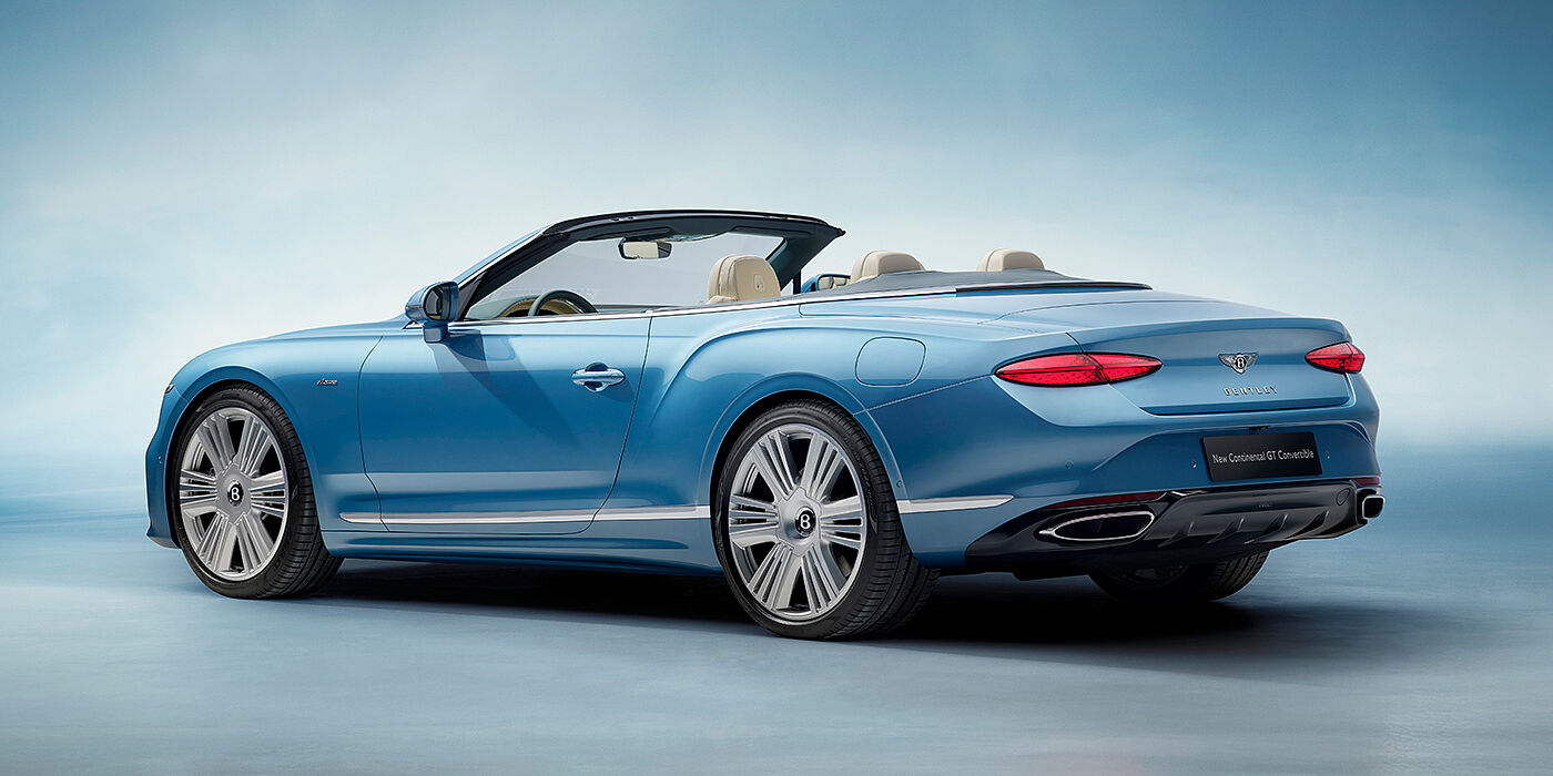 Bentley Tallinn New Bentley Continental GTC Azure convertible rear view in Light Windsor blue paint with 22 inch ten spoke wheels and chrome exterior details