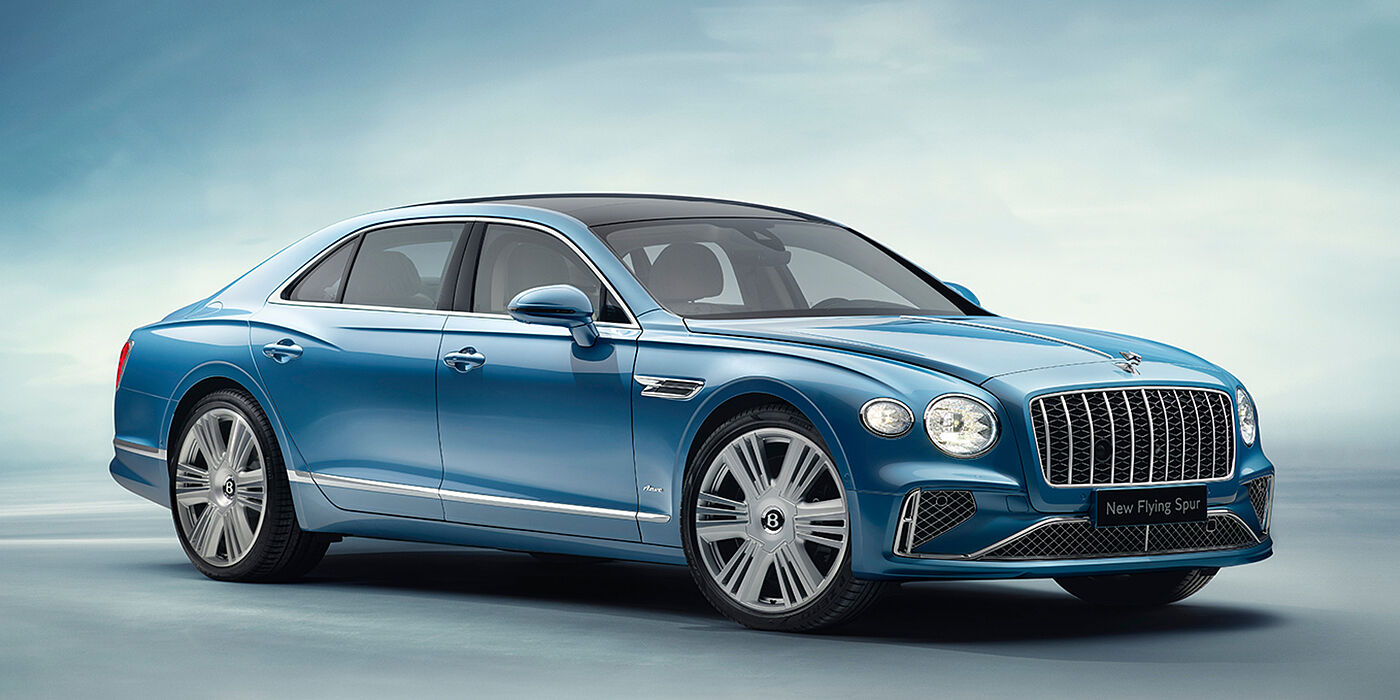 Bentley Tallinn New Bentley Flying Spur Azure sedan front view in Light windsor blue by Mulliner paint with 22 inch Azure wheels and chrome exterior details