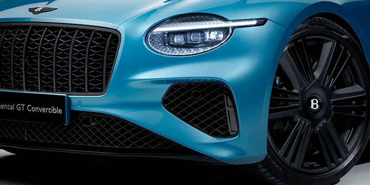 Bentley Tallinn New Bentley Continental GT Azure coupe bonnet detail with Blackline Specification including black grille and wheels with Light Windsor blue paint