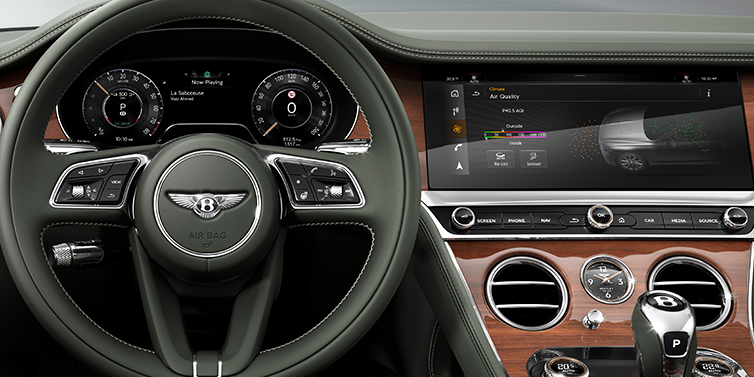 Bentley Tallinn New Bentley Continental GTC convertible front interior steering wheel view, with Beluga black leather and Crown Cut walnut veneer